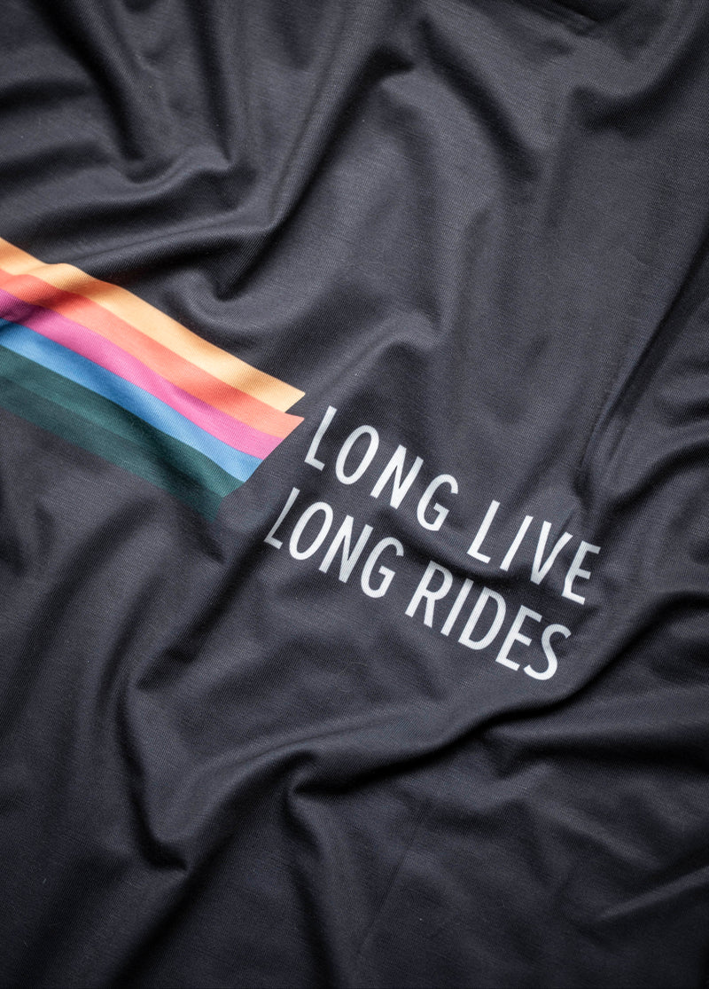 Black t-shirt with 'LONG LIVE LONG RIDES' text and rainbow design on a dark fabric background